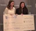 First place winners Anna Amundson & Marin Connelly pose with their full tuition check to Thomas More University.